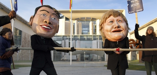 Philipp Roesler (FDP ) a Angela Merkel (CDU/CSU). 